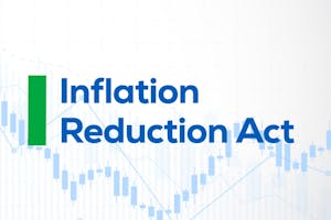 The words Inflation Reduction Act over an image of a candlestick chart, representing what The Inflation Reduction Act of 2022 is and how it’s being funded, and the value of new solar tax credits.