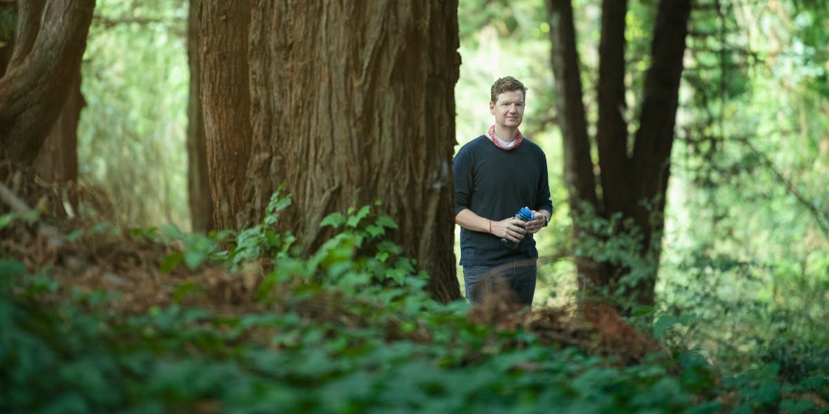 Chris Kemper in a forest.