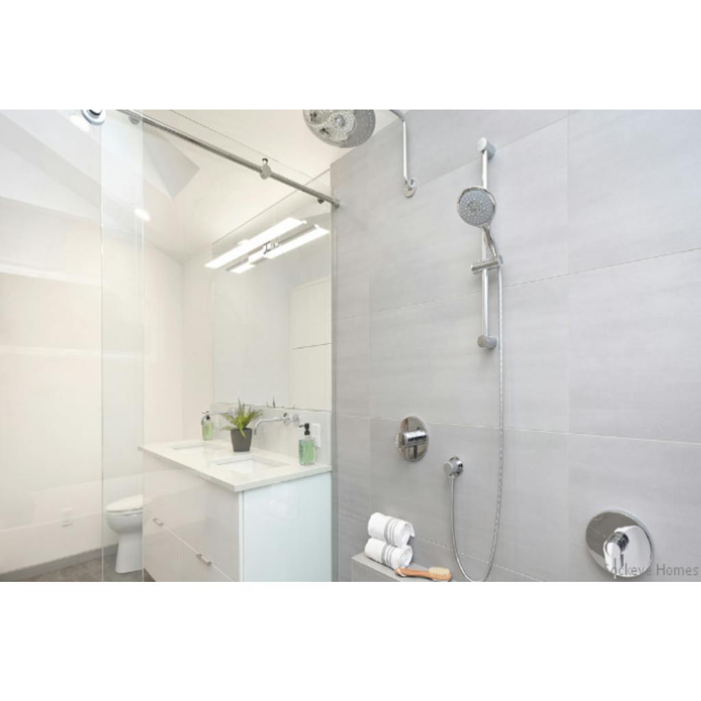 Bathroom, after the renovation. Photo: Tod Sakai/Sockeye Homes via Qualified Remodeler Bathroom, after the renovation. Photo: Tod Sakai/Sockeye Homes via Qualified Remodeler
