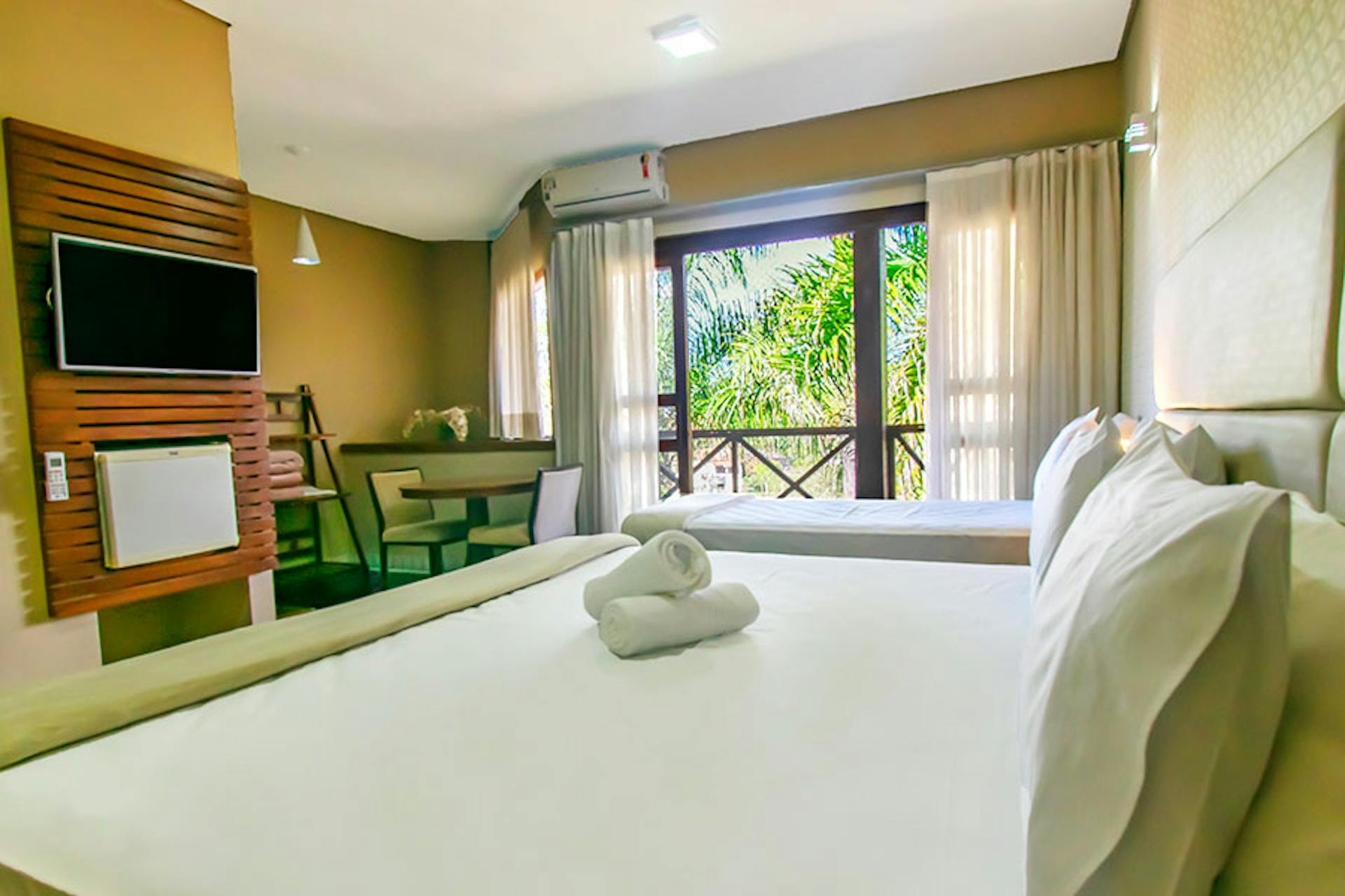 quarto de hotel fazenda espaçoso e aconchegante