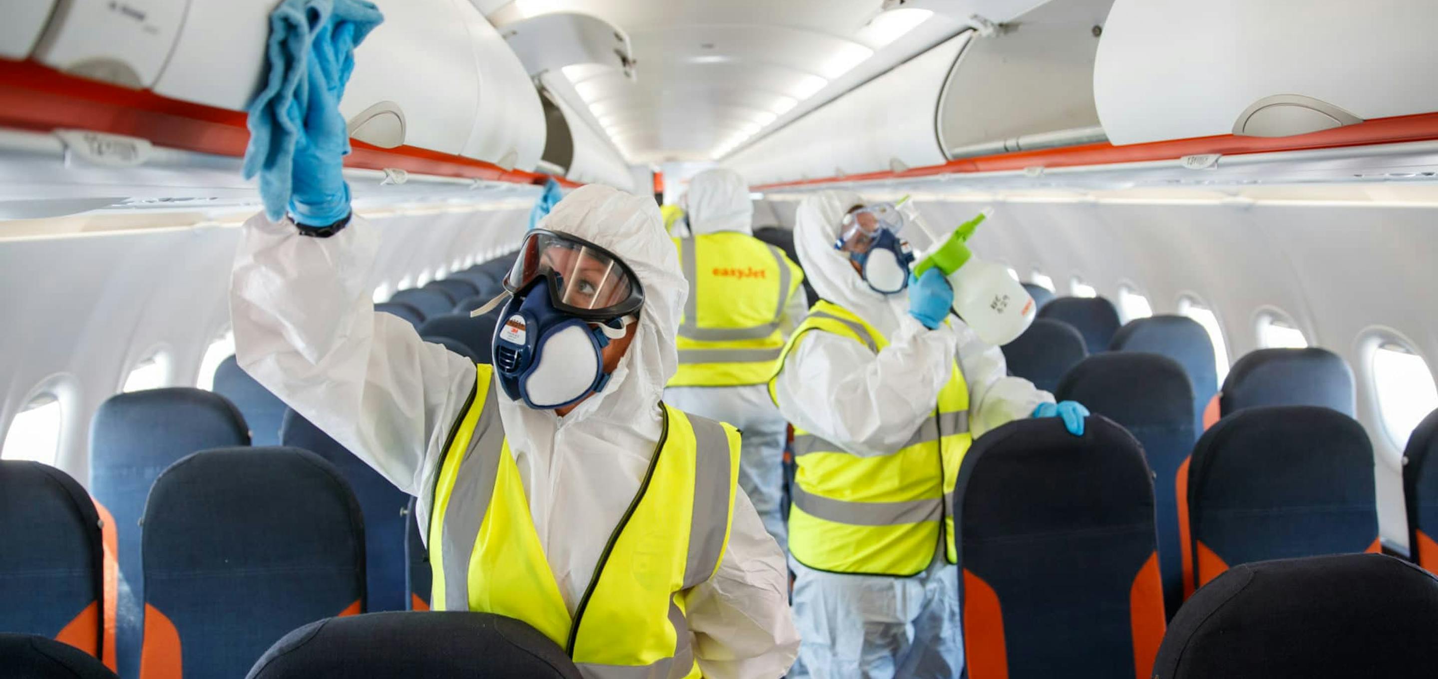 Cleaners disinfecting plane
