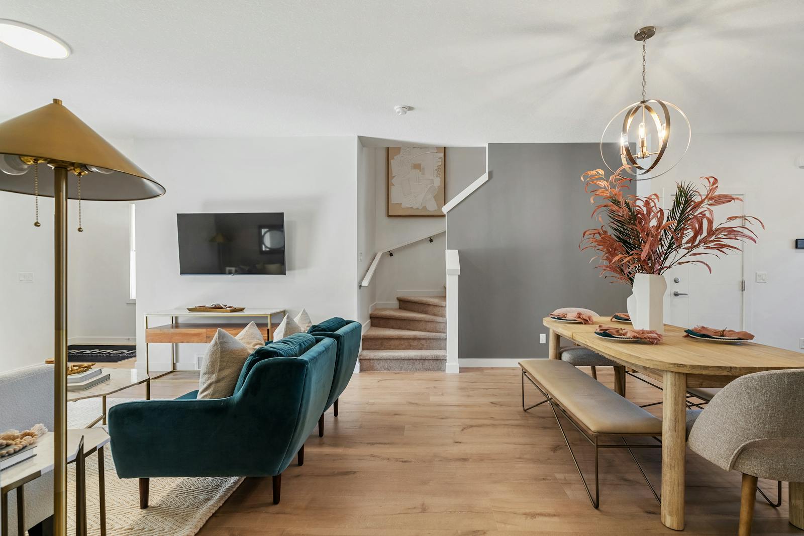 Living and eating space with a wooden floor.