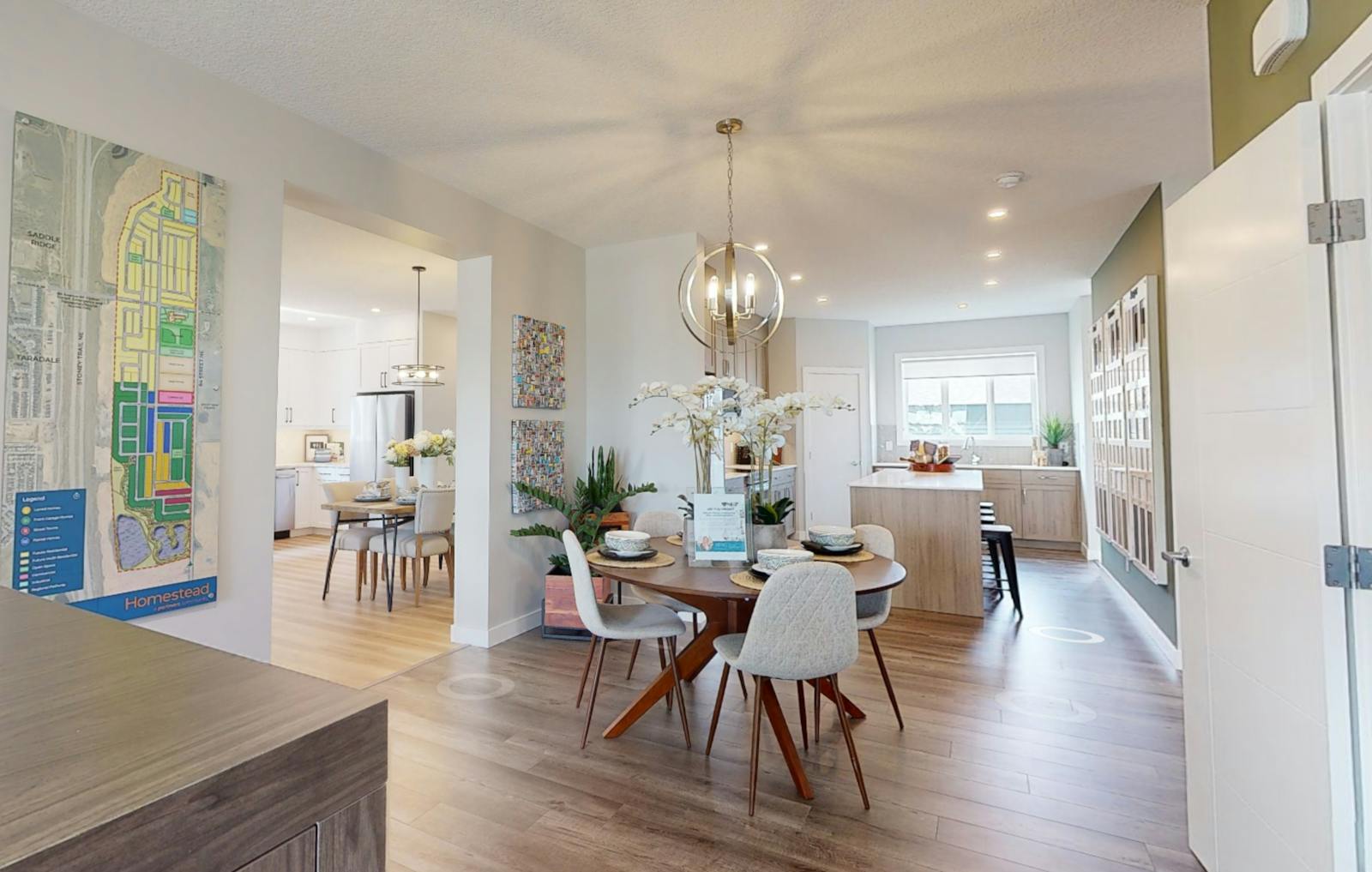 Kitchen area with wooden floors.