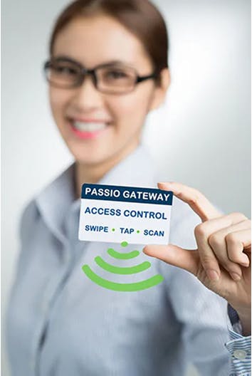 Smiling person holding a Passio Gateway access control card, indicating support for swipe, tap, or scan methods with a green wireless signal icon below the card.