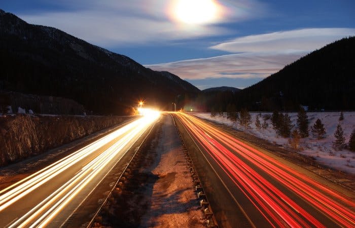 Time-lapse photograph of roads at night