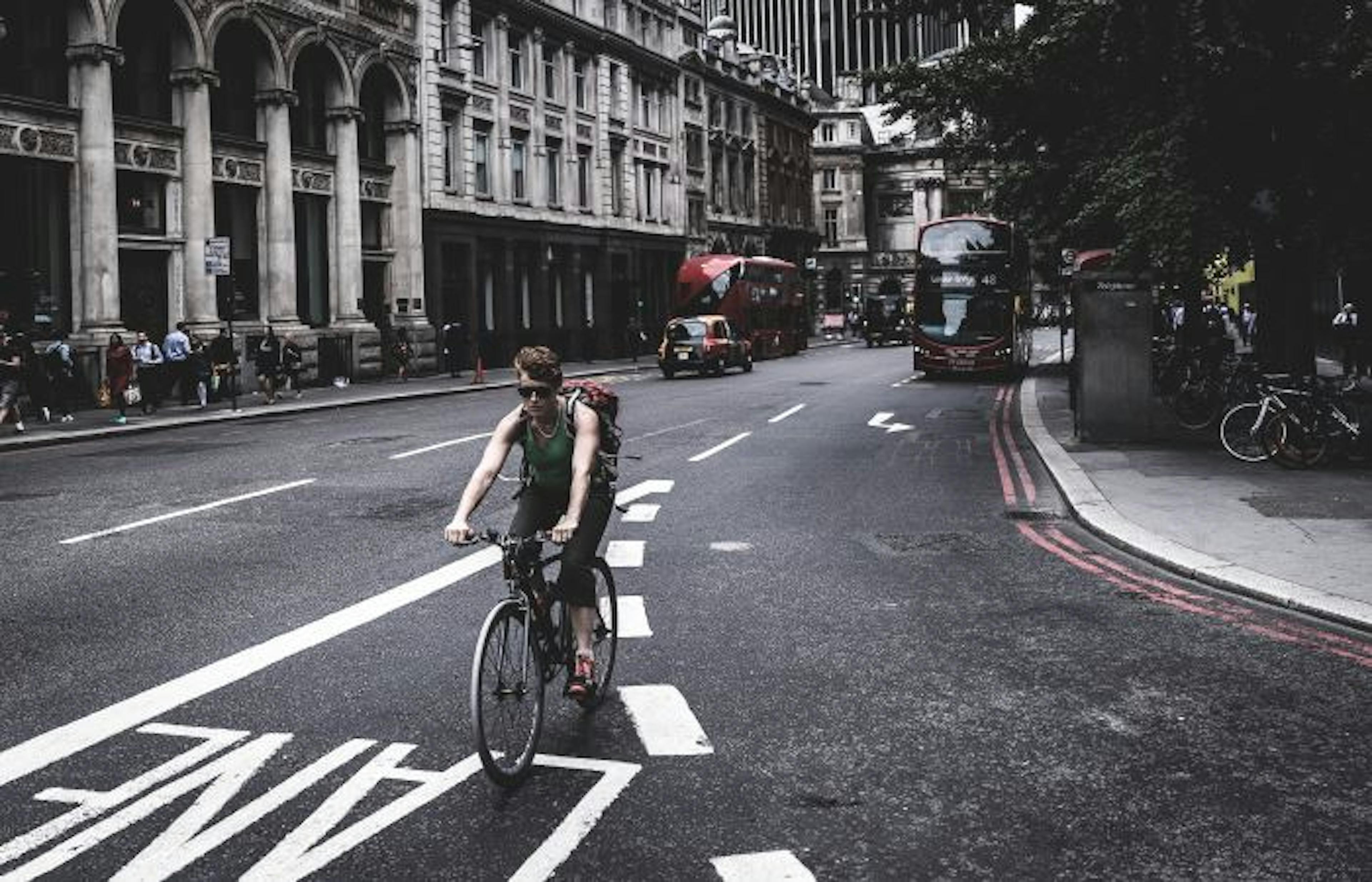 photograph of a cyclist on the road