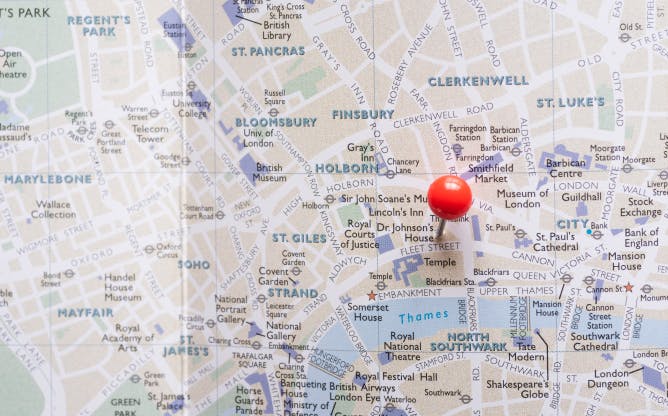 A map of London with a red pin pinned into it