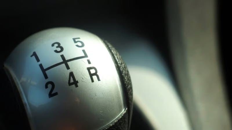 Close-up photo of the knob of a gear stick