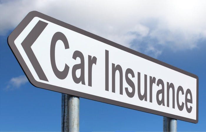A sign with the words 'car insurance' on it