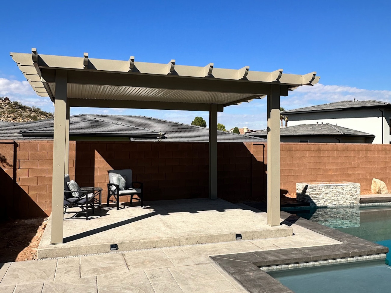 Free standing solid top aluminum patio cover located in Las Vegas, Nevada with corbel rafter tails