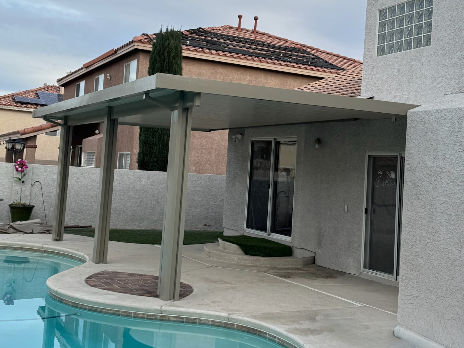 Tan insulated cover by Las Vegas, Nevada poolside providing reduced summer temperatures
