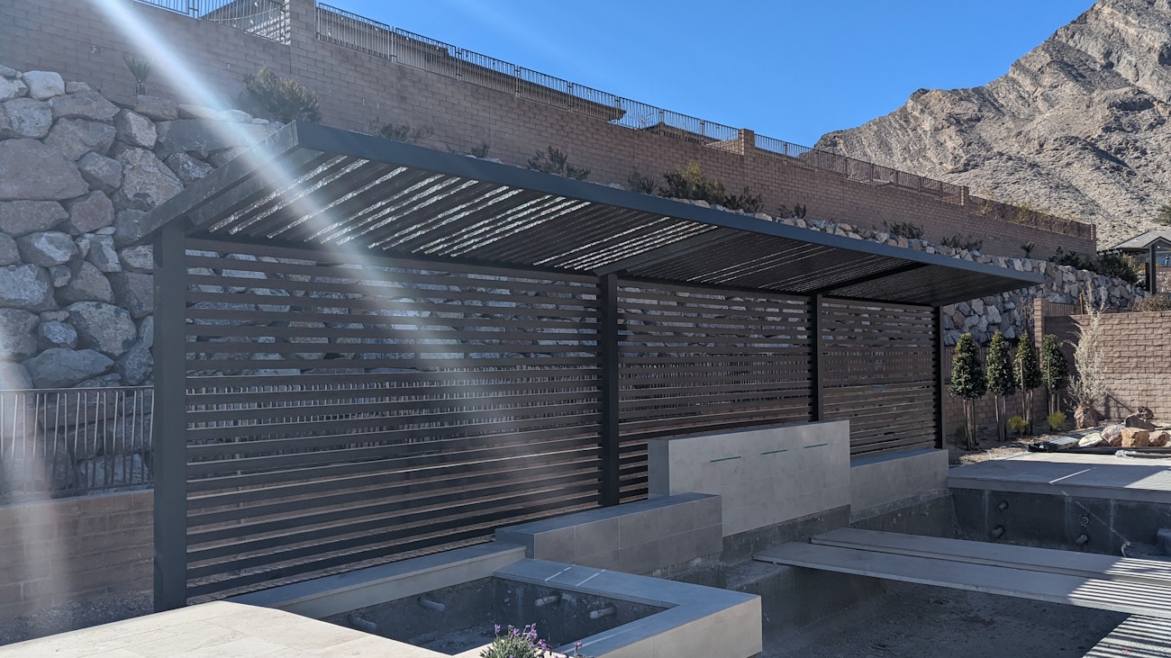 4K aluminum awning with privacy wall installed by poolside for Las Vegas, Nevada home owner