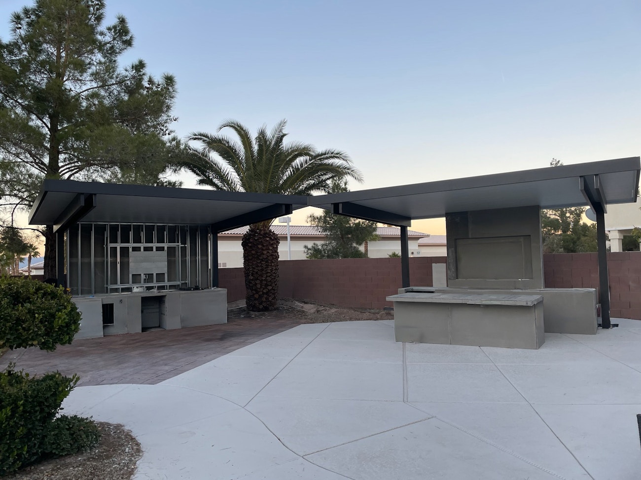 Two premium luxury 4K covers for outdoor kitchen and entertainment areas installed in Henderson, Nevada