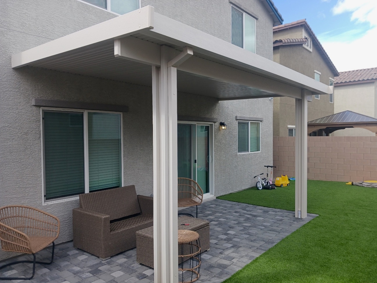 Simple white aluminum awning to protect patio from harsh Phoenix, Arizona sun