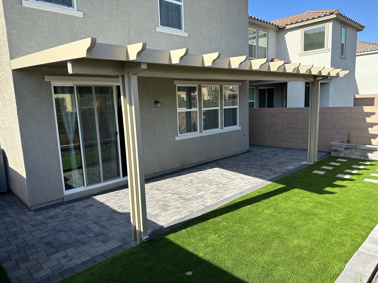 Aluminum insulated cover in beige with scallop rafter tails for home in Saint George, UT
