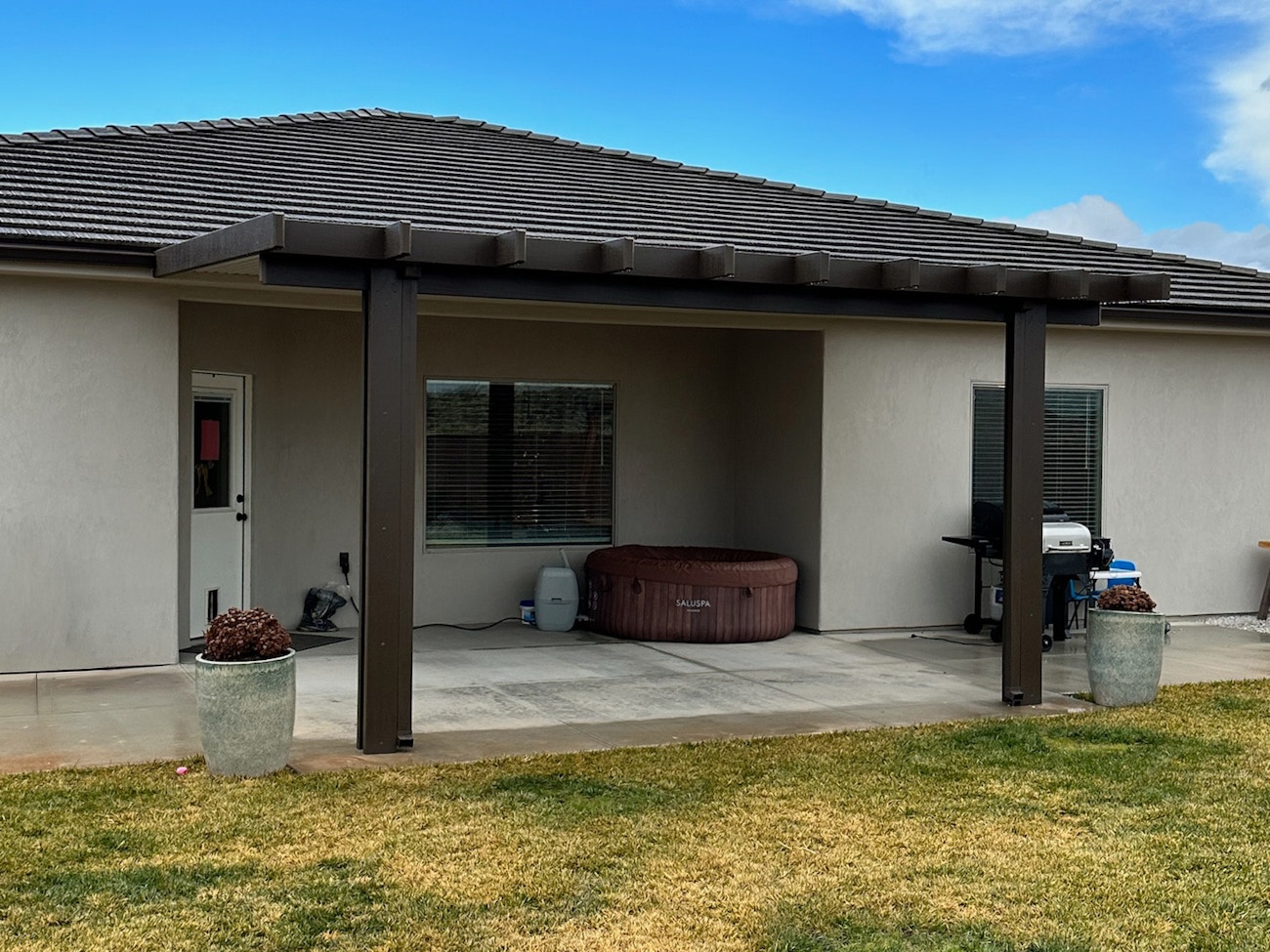 Energy-efficient insulated awning in brown installed in Washington, Utah