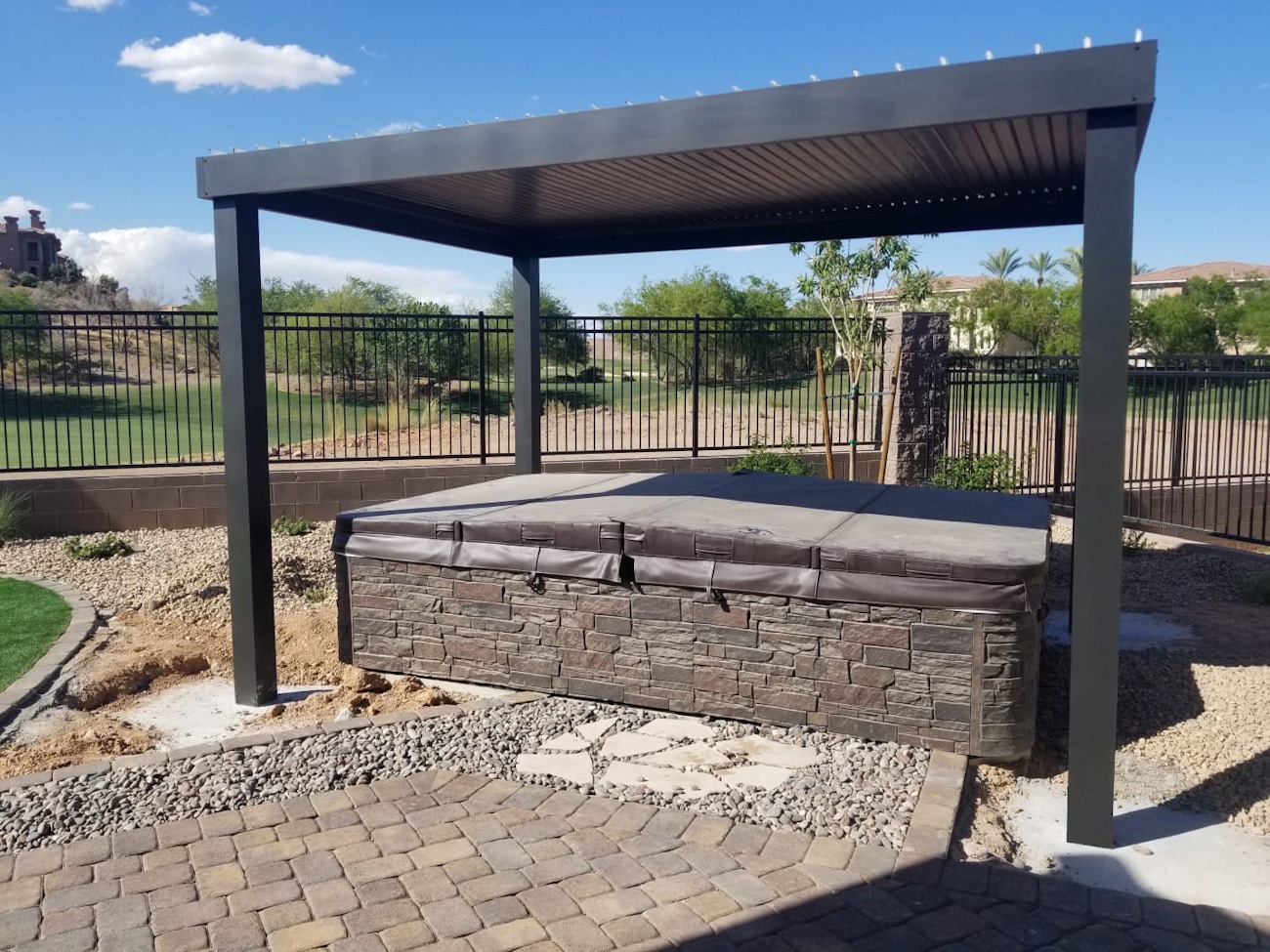Free standing black 4K luxury aluminum awning covering outdoor hot tub in Saint George, Utah