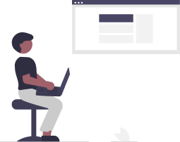 image of a man sitting on a chair with a laptop