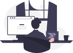 image of a man at his desk on his computer