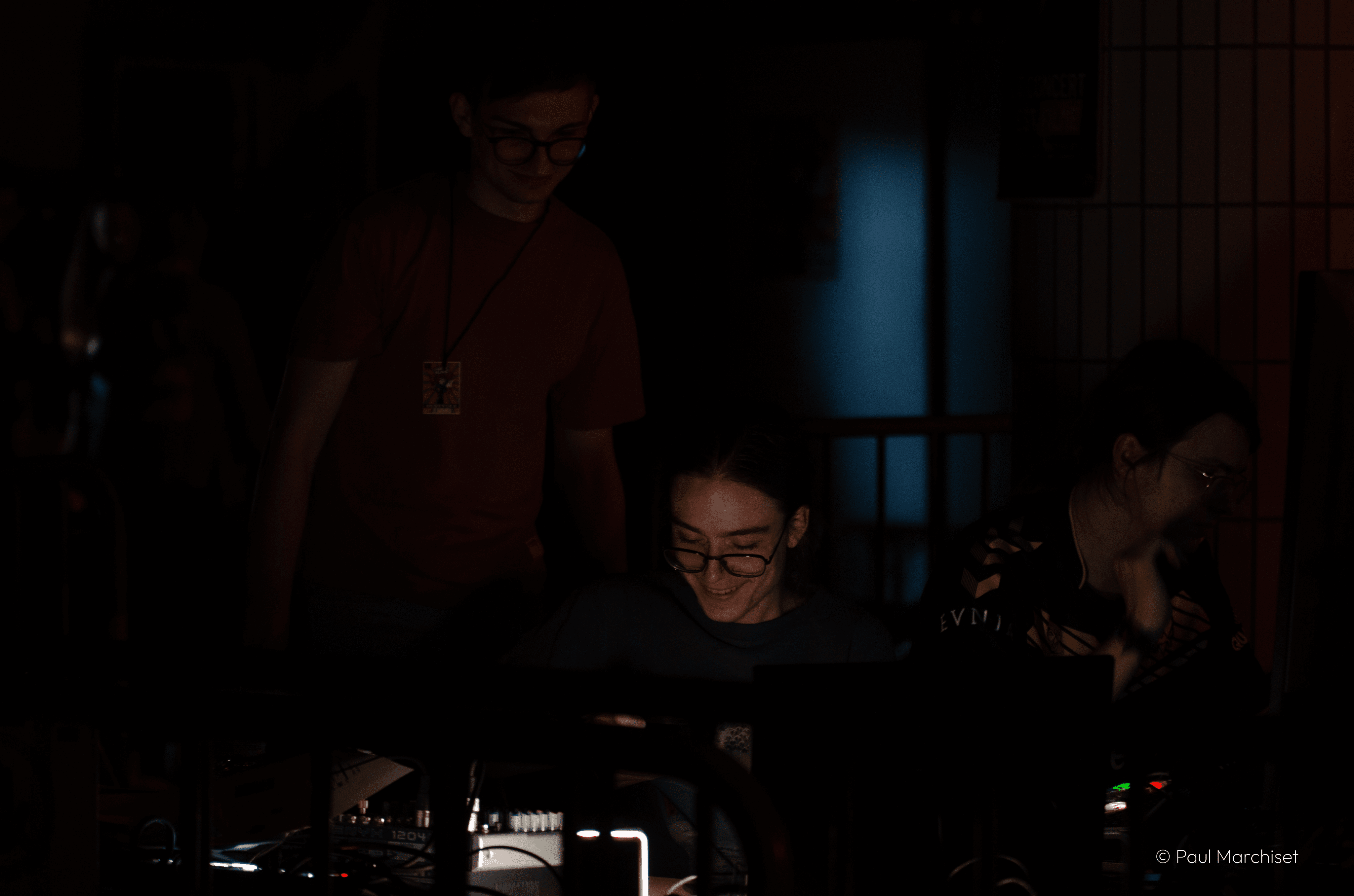 picture of Paul Marchiset in front of a producing video mixer next to Maxime Legrand