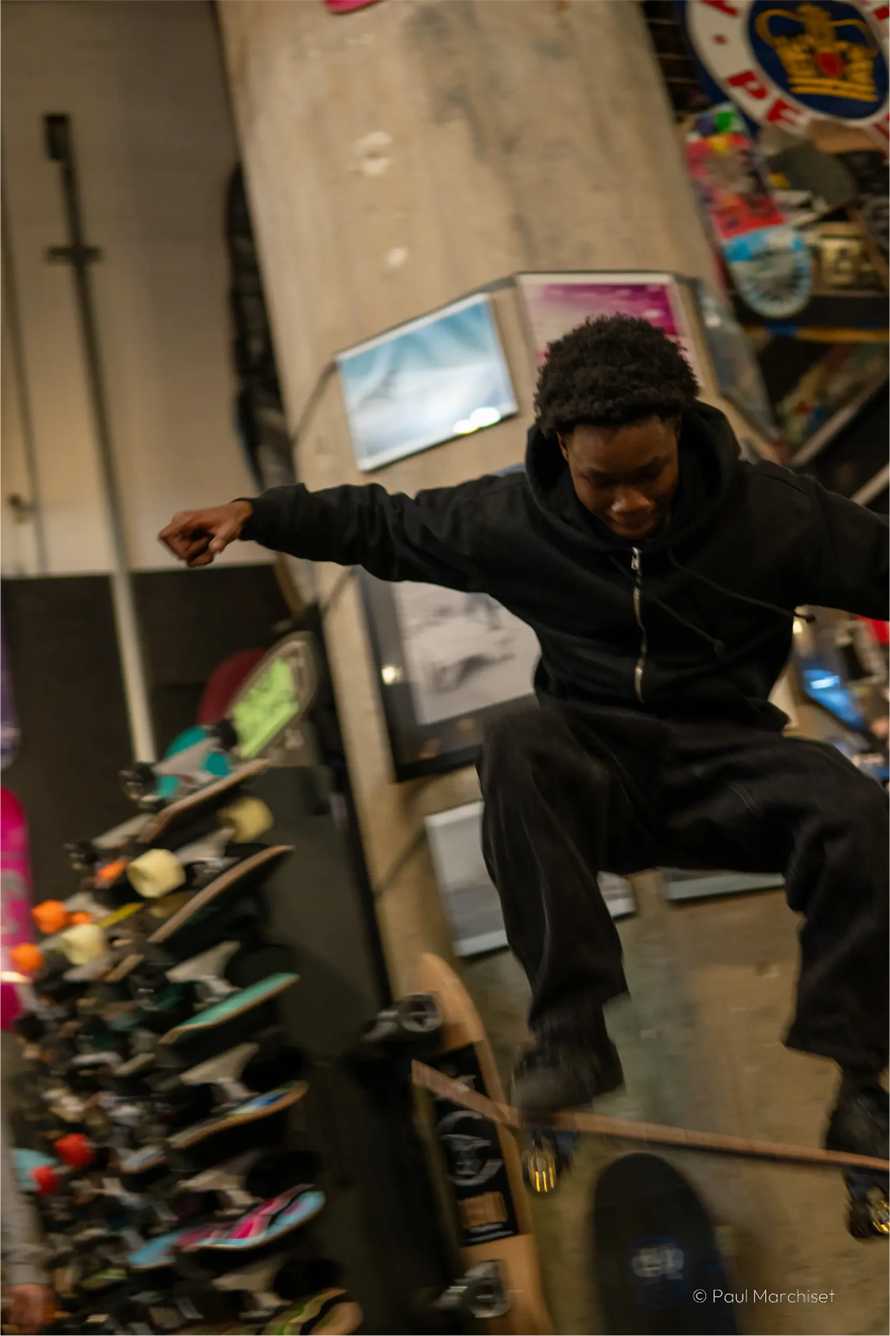 skater jumping inside a store