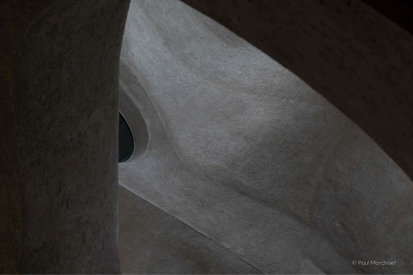 gray concrete walls with curves