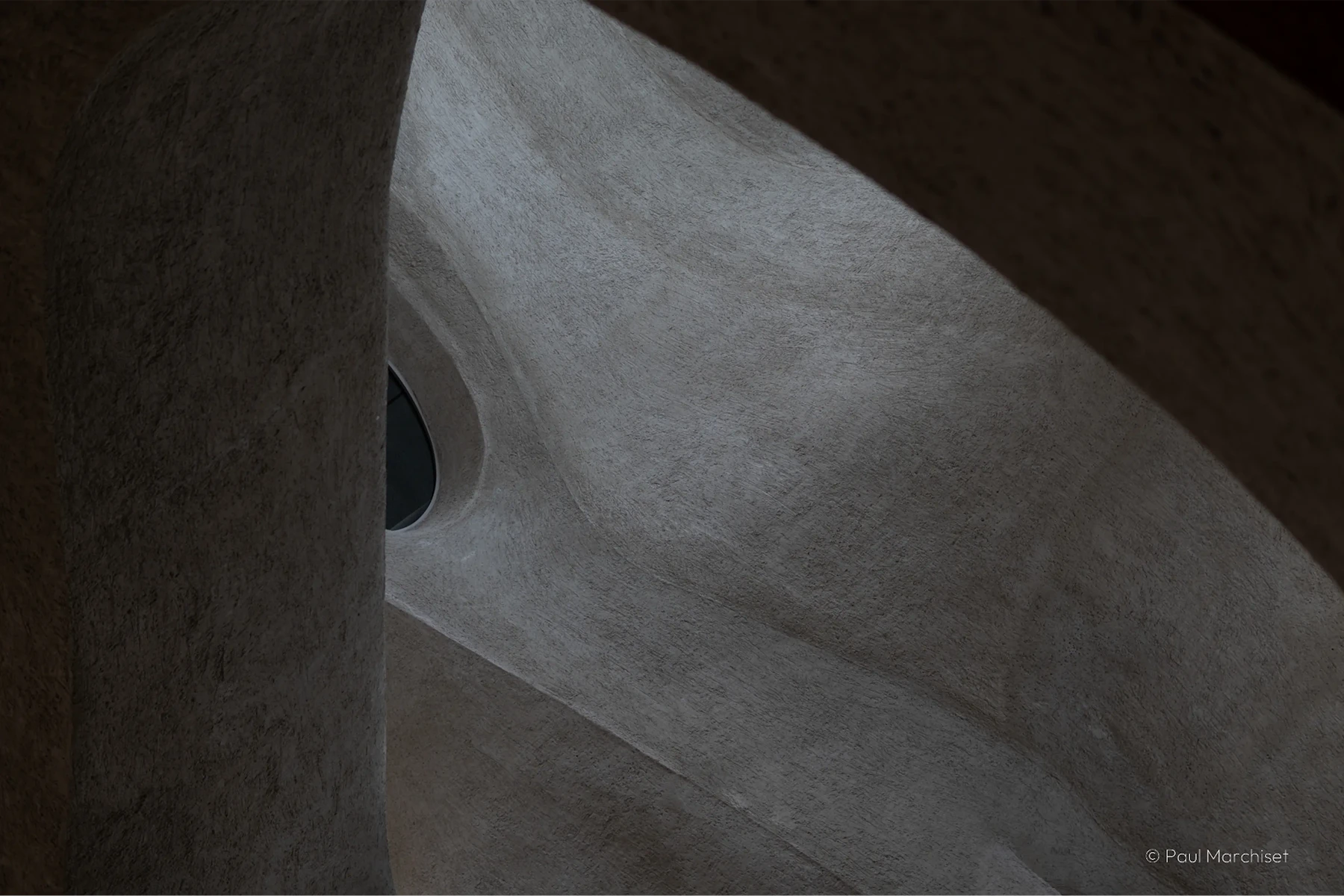 gray concrete walls with curves