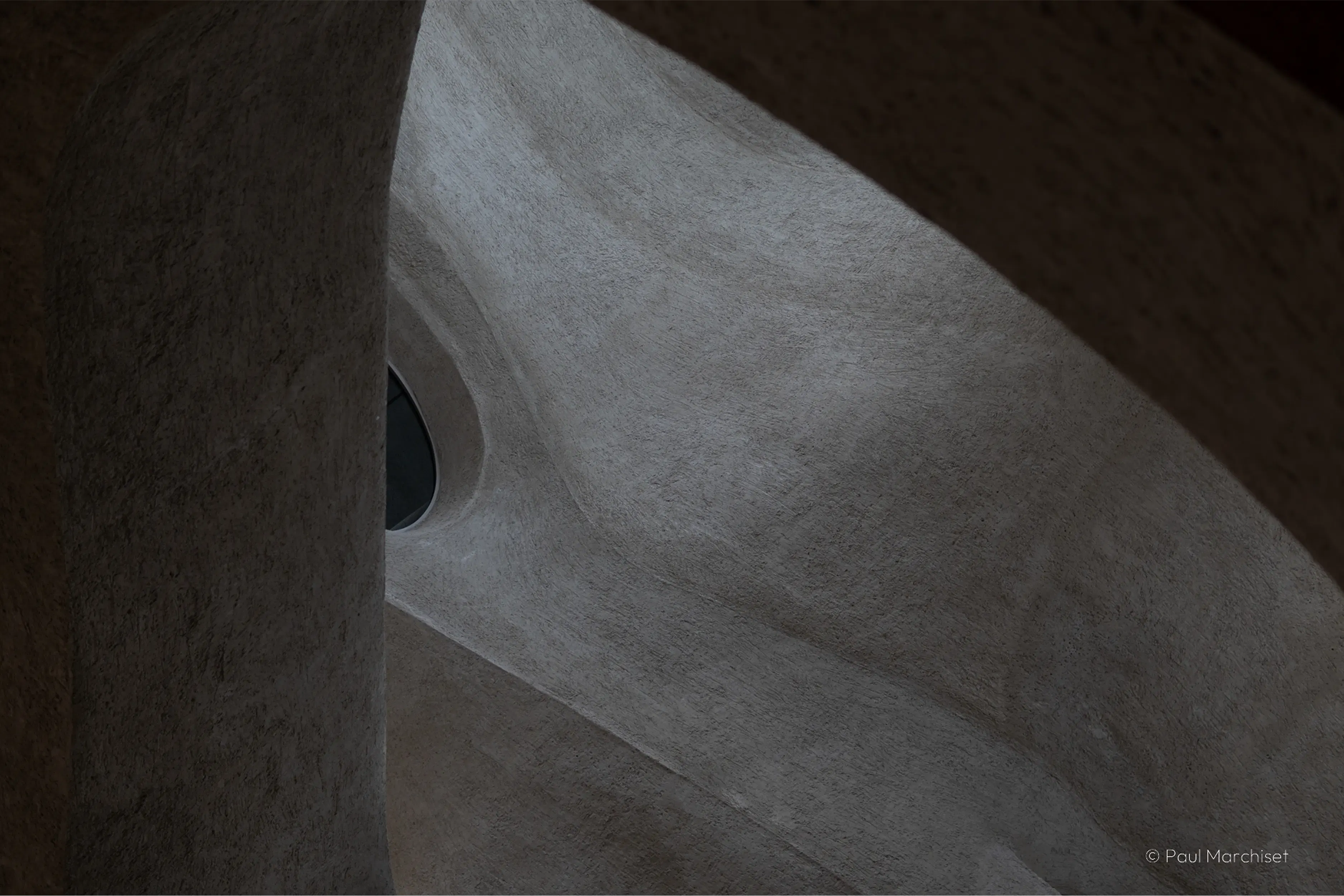 gray concrete walls with curves