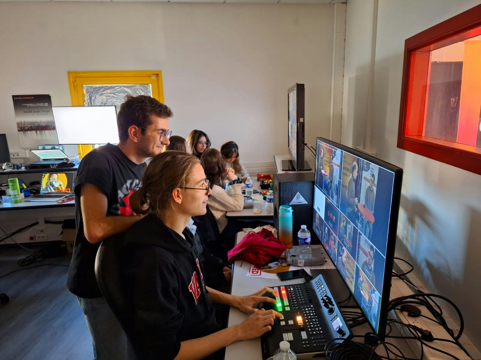 Paul Marchiset and Timéo Binda working for a tv broadcast production