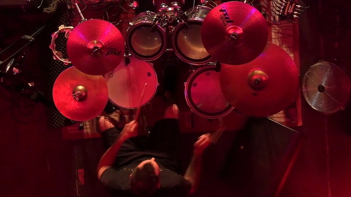 top shot of a drum with a red light