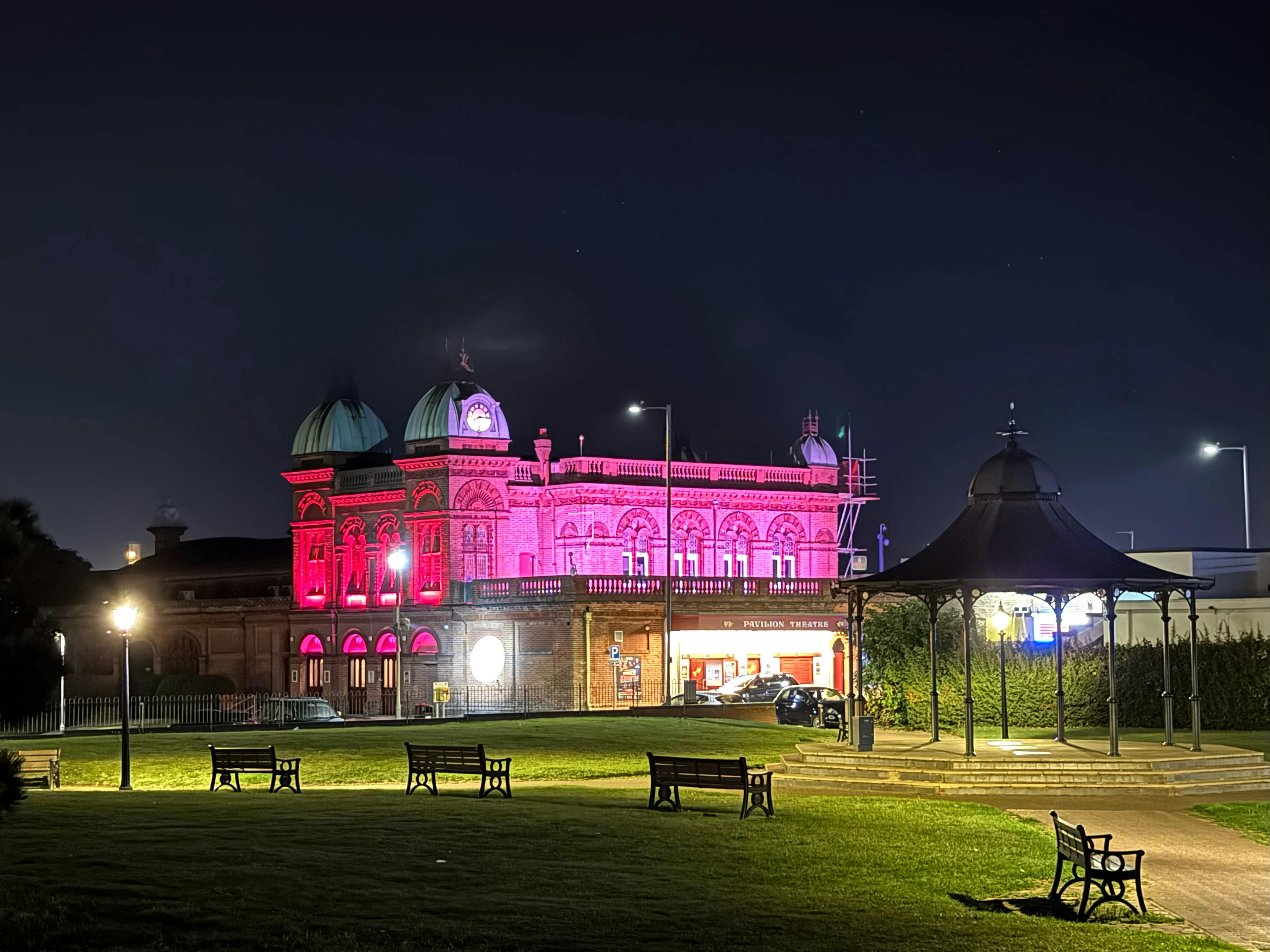 The Pavilion Theatre in Gorleston lit up in pink lights