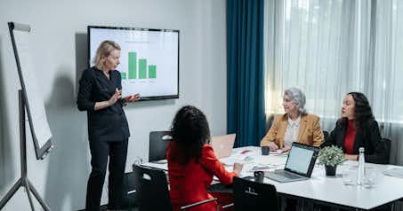 Business women at a meeting.