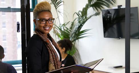 Woman in an office setting.