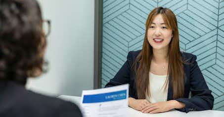 image of a woman in an interview being recruited by another woman