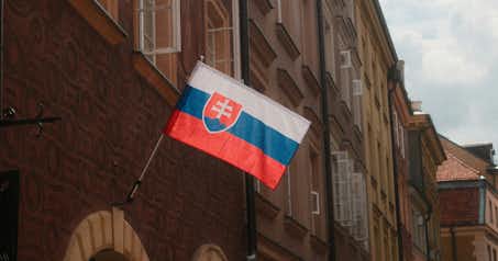 Flag of Slovakia on a street facade.