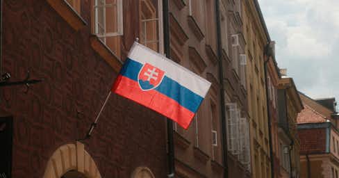 Flag of Slovakia on a street facade.