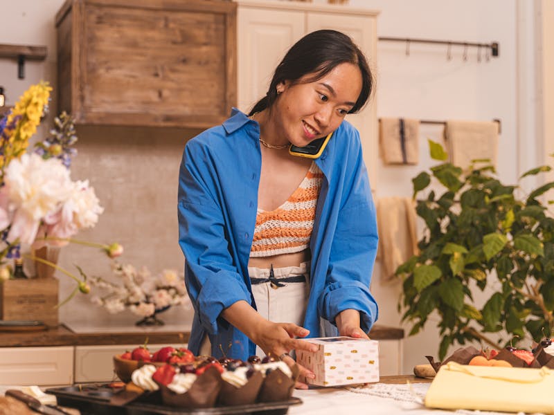 Girl with small business packing her product