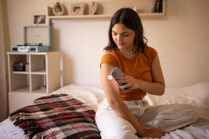 young woman diabetes check
