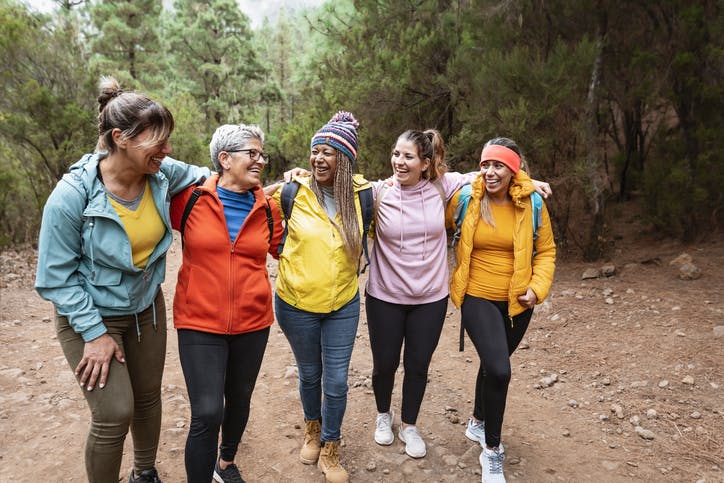 women walking hiking