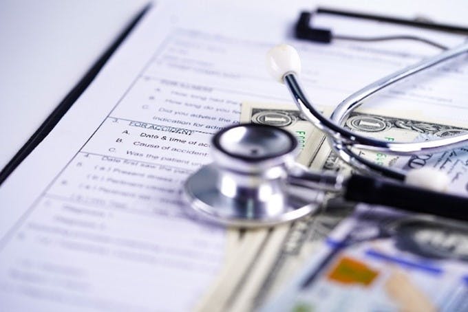 stethoscope on documents