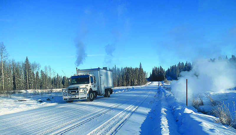 Peaceland steam truck steaming a culvert