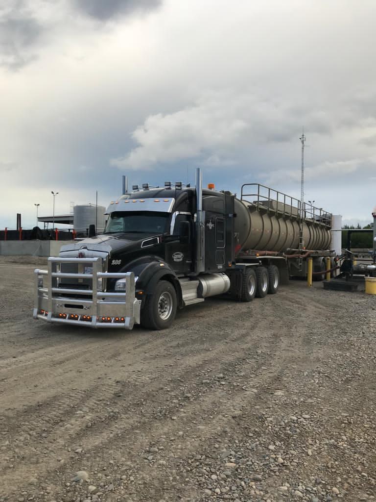 Peaceland tanker truck loading up at an oil and gas facility