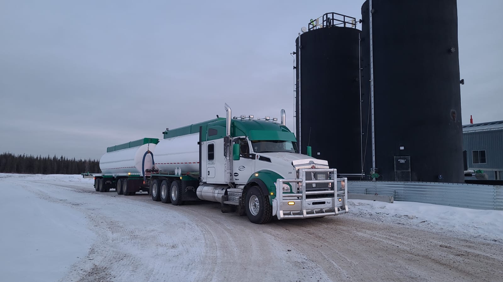 Peaceland truck hauling acid to an oilfield site