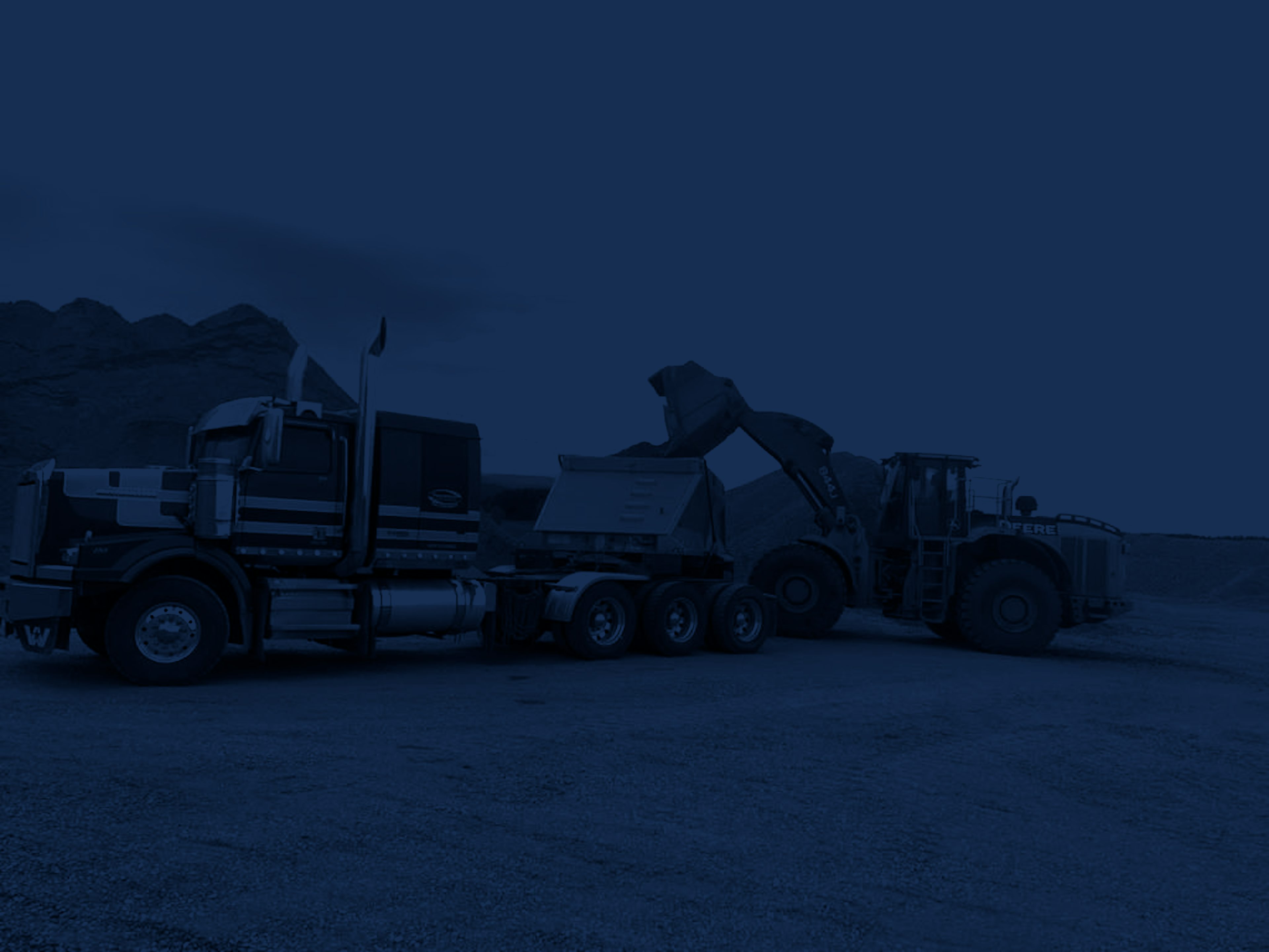 Peaceland gravel truck being loaded with aggregate