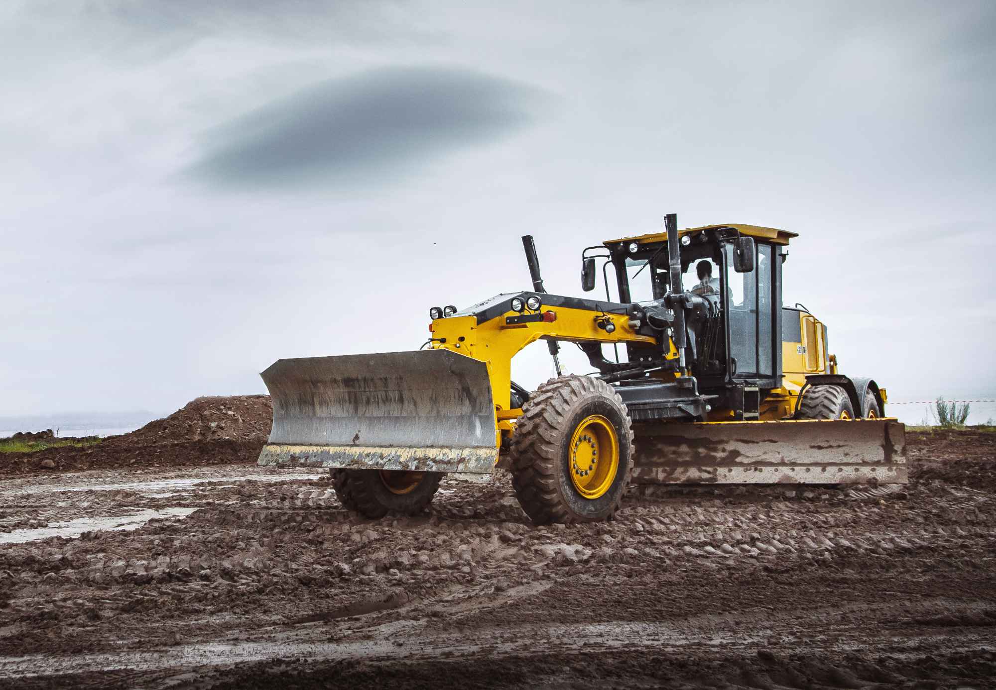Peaceland Oilfield grader in service on oilfield lease