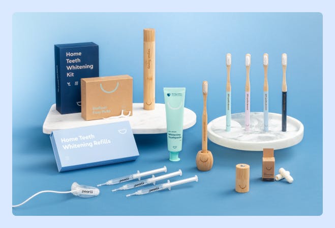 The whole Pearlii Oral Care Collection displayed against a blue background