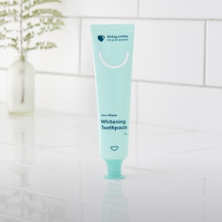 Marketing image of 1 x Pearlii Zero-Waste Whitening Toothpaste, sitting on a bathroom benchtop
