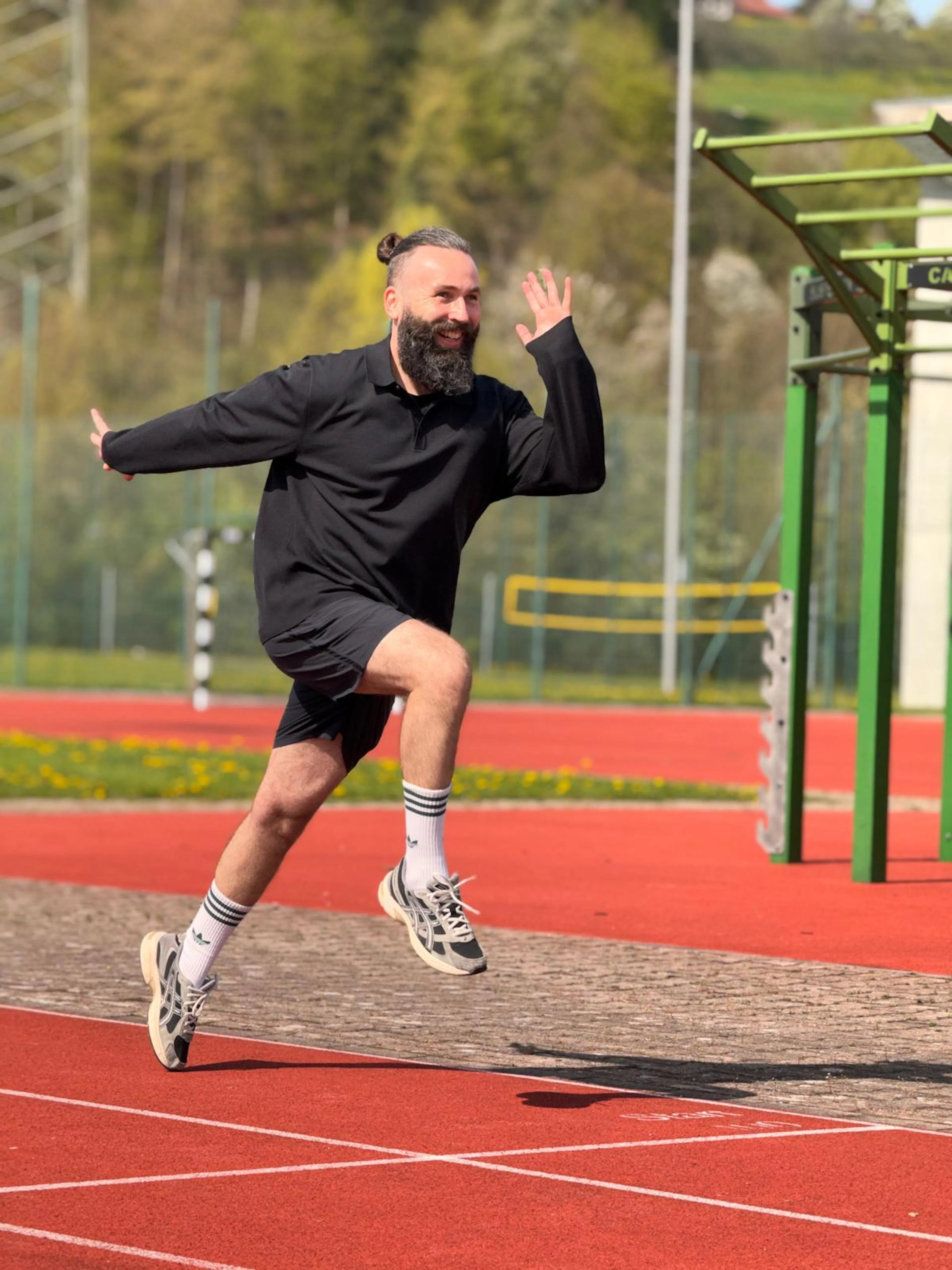 Peter running while smiling