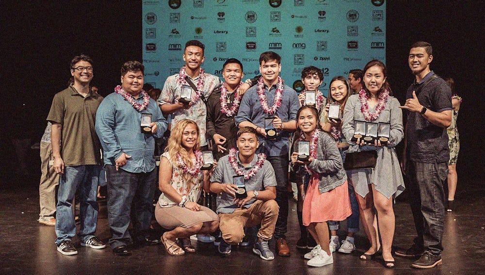 Group of high school Pele Award winners on stage.