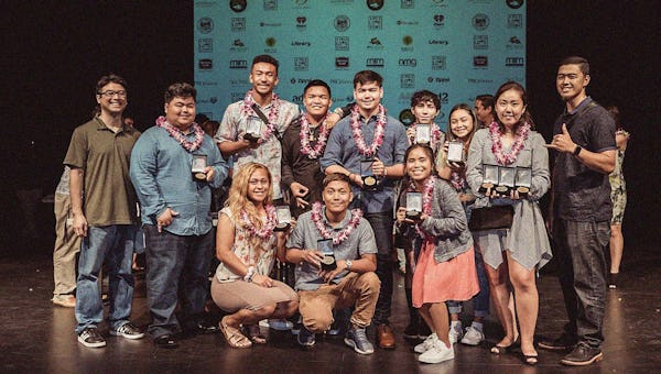 Group of high school Pele Award winners on stage.